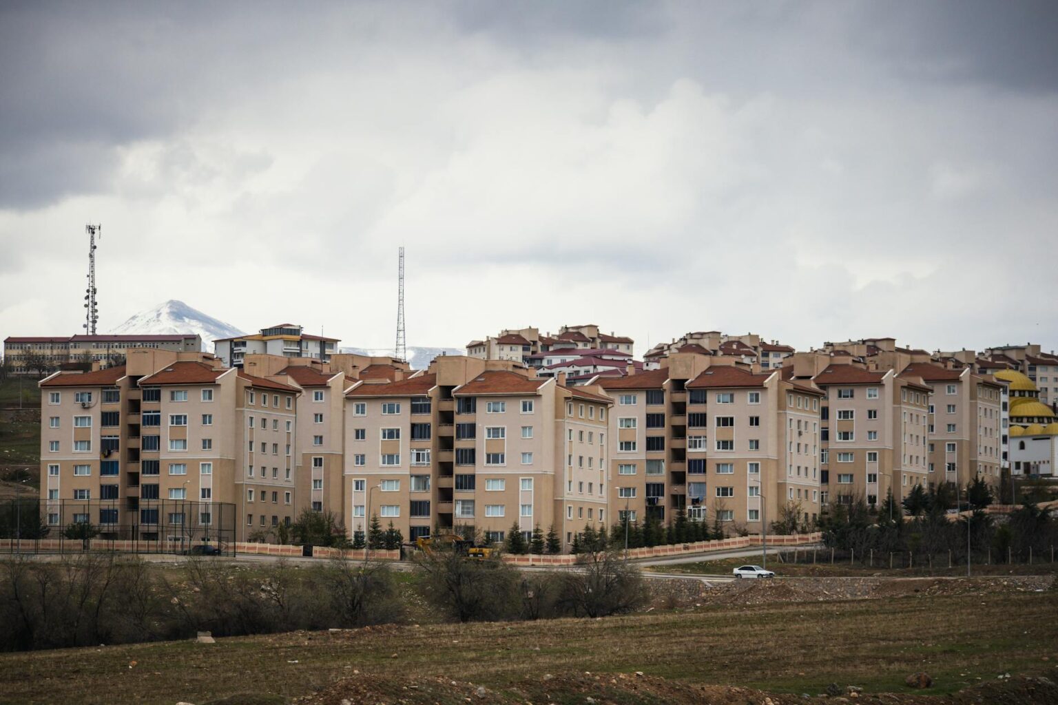 Contemporary multi-unit housing development with shared outdoor spaces