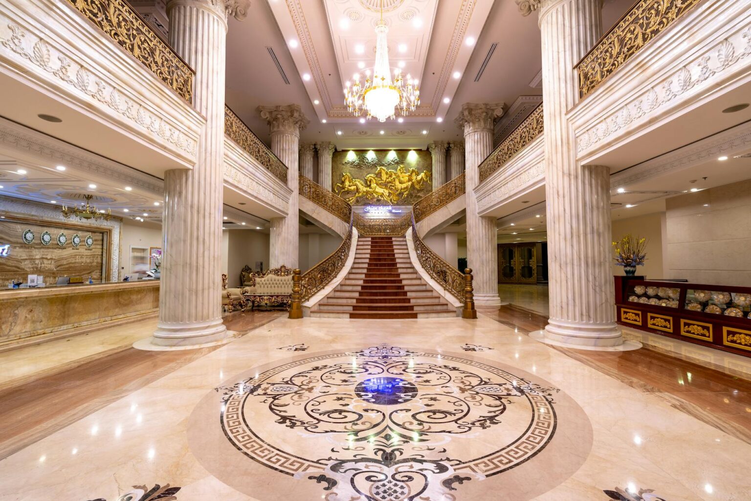 Elegant luxury hotel lobby with marble floors and modern furnishings