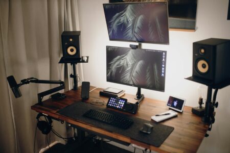 How Twitch Streamers Are Replacing Traditional Late Night TV Modern streaming setup with multiple monitors, professional lighting, and gaming equipment for content creation