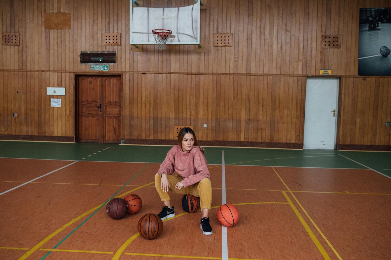 Female basketball player on court during game