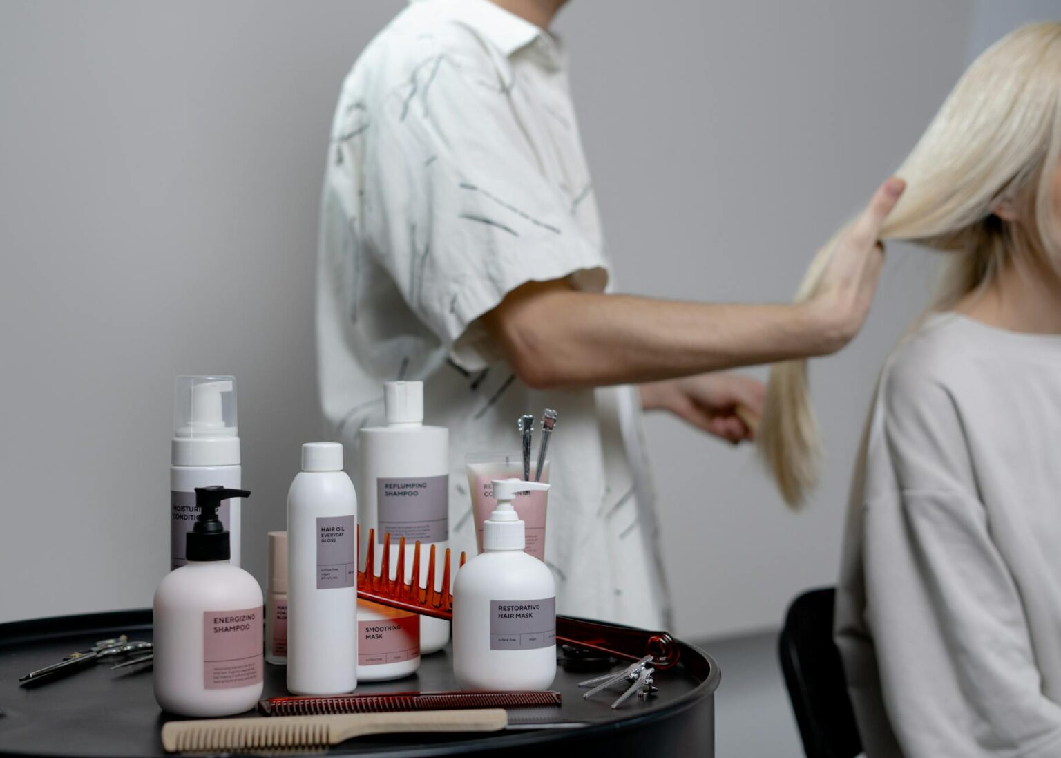 Various hair growth serums and treatments arranged on a clean surface