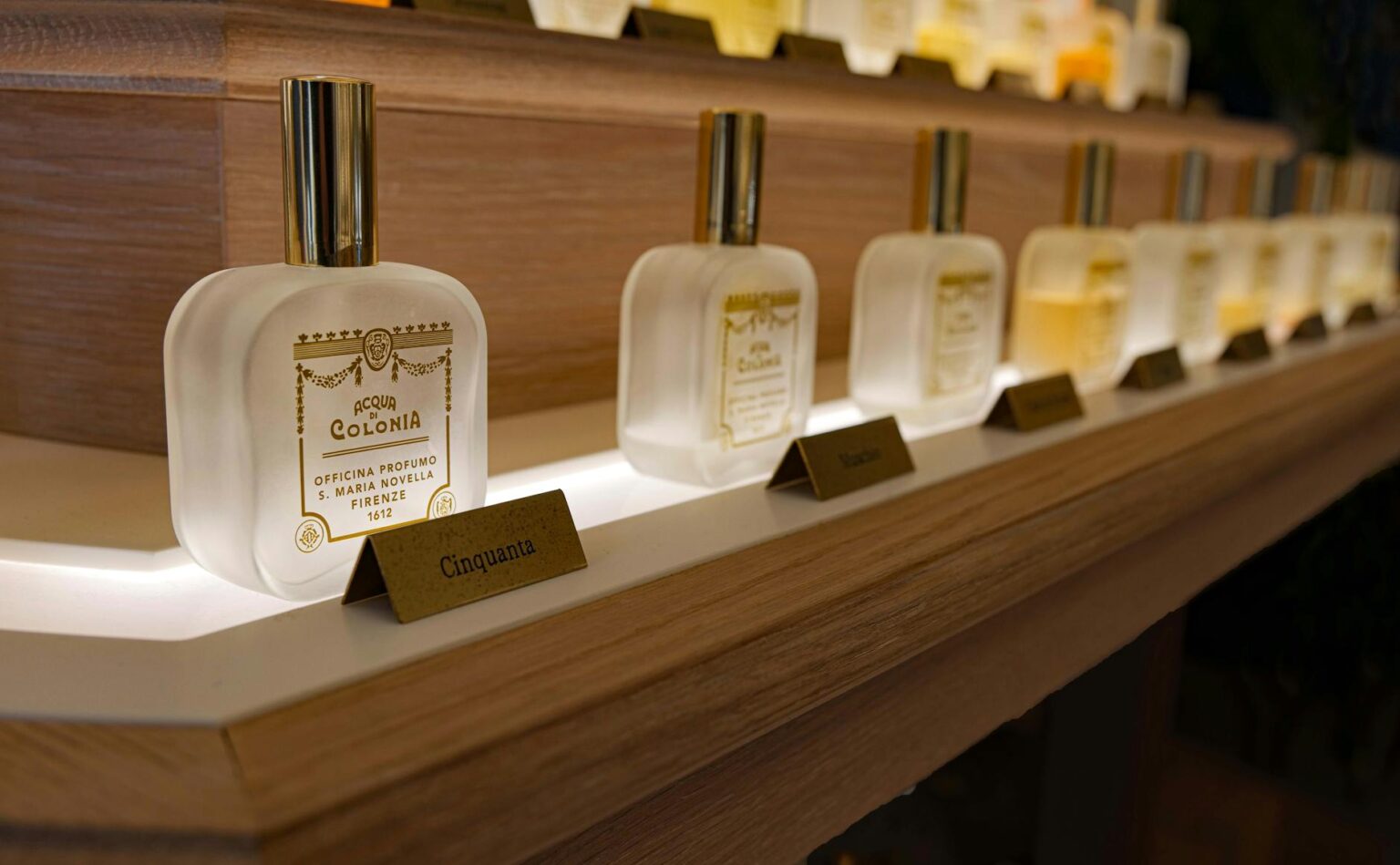 Collection of various perfume bottles arranged on a clean surface