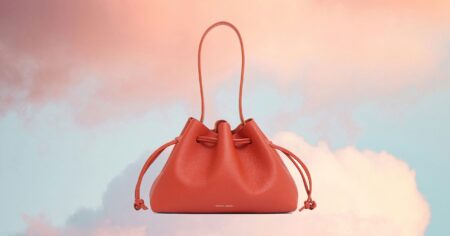 Nordstrom’s Half Yearly Sale Is Here: 29 Fashion & Beauty Finds To Cart Up Woman browsing clothing racks at a department store sale
