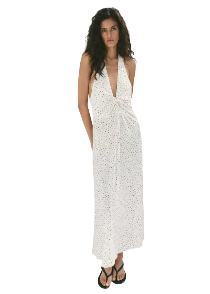 Flowing linen maxi dress photographed in natural sunlight
