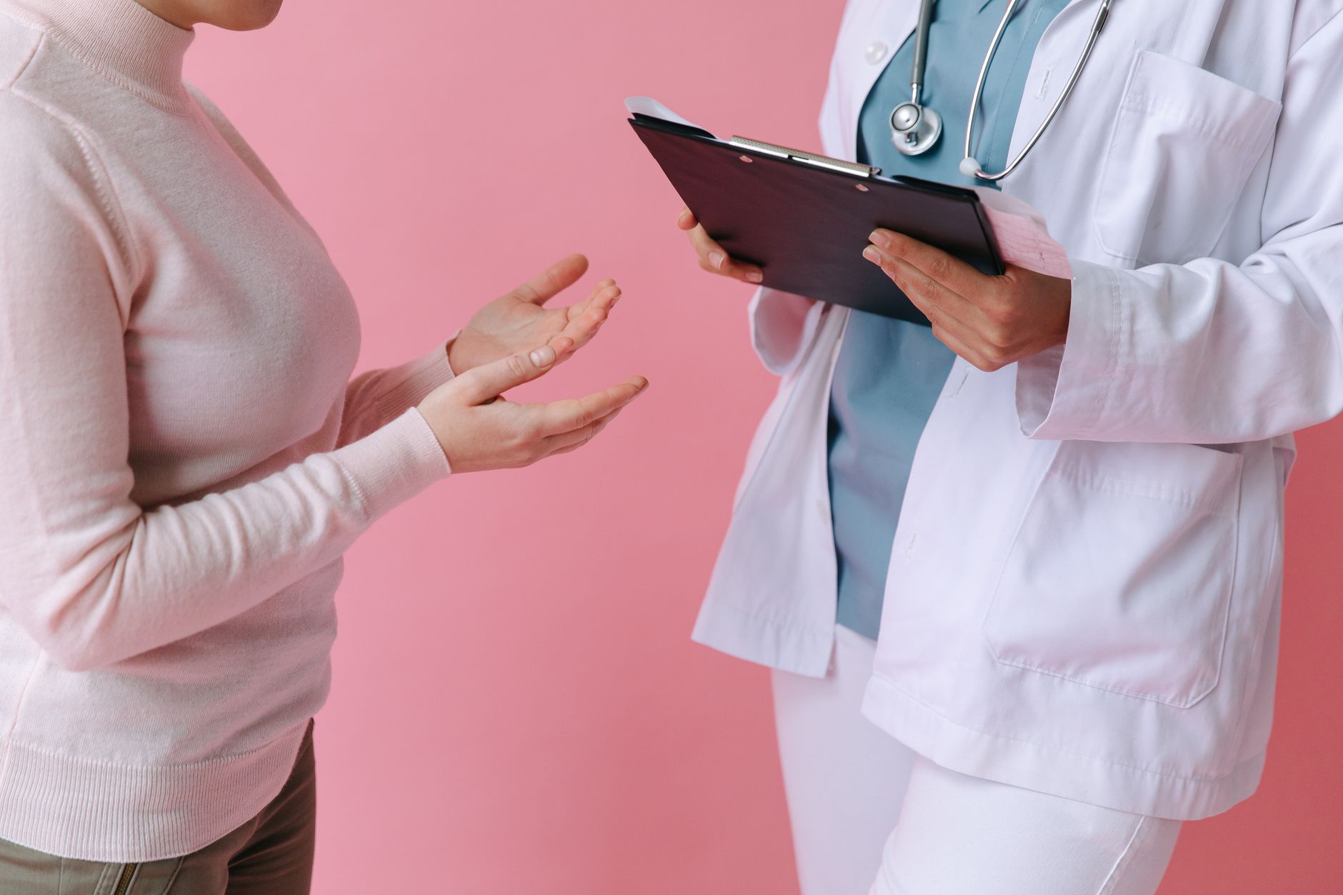 Woman speaking with a doctor during a medical appointment