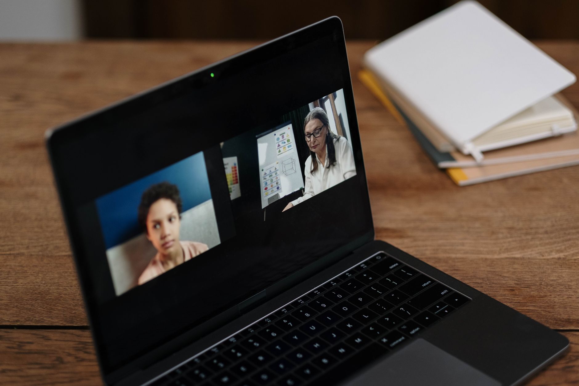 Person having a casual video call on a laptop at home