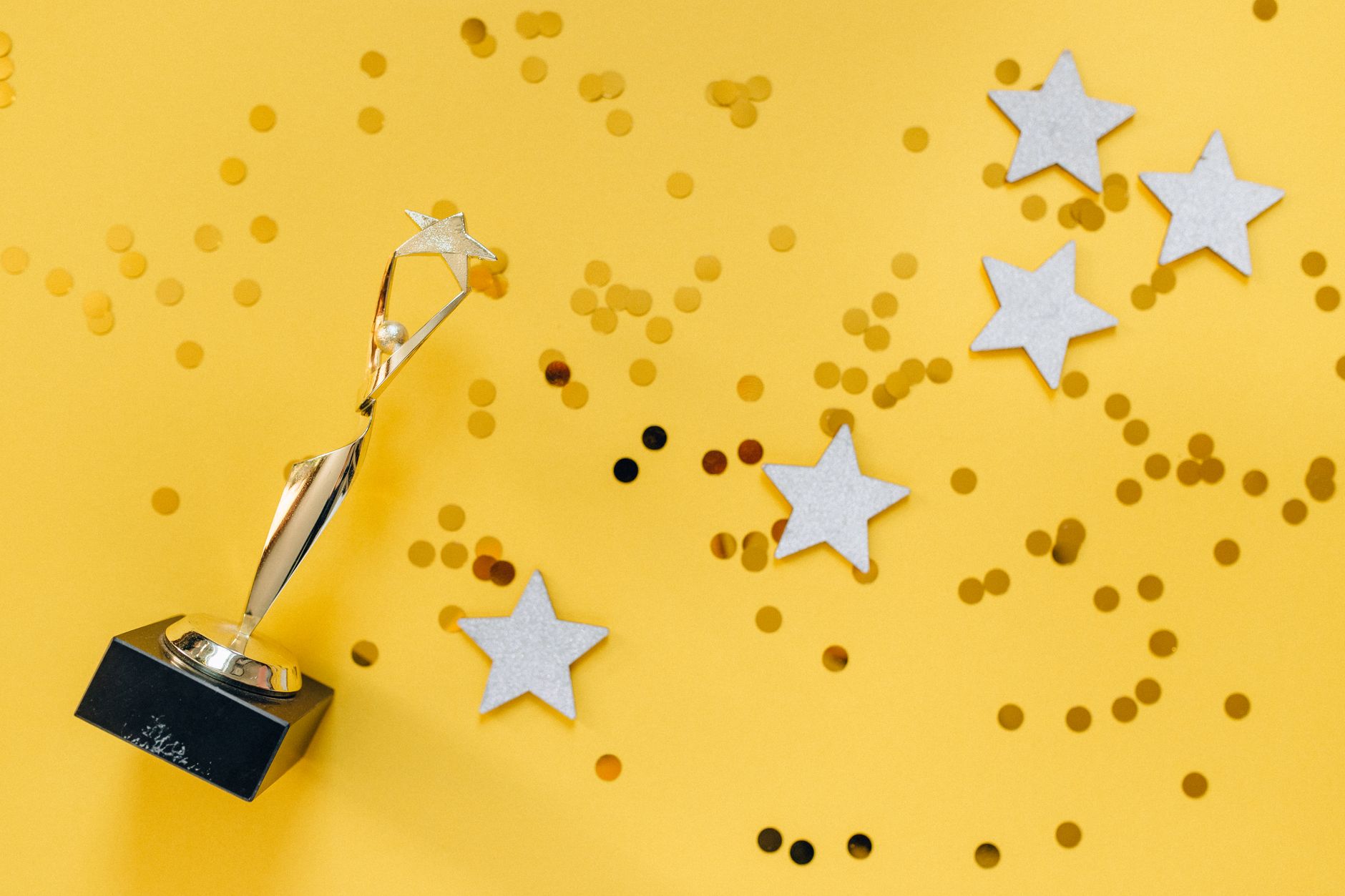 Close-up of a gold award trophy on a dark background