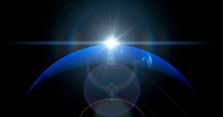 Deep blue night sky with glowing planet visible above the horizon