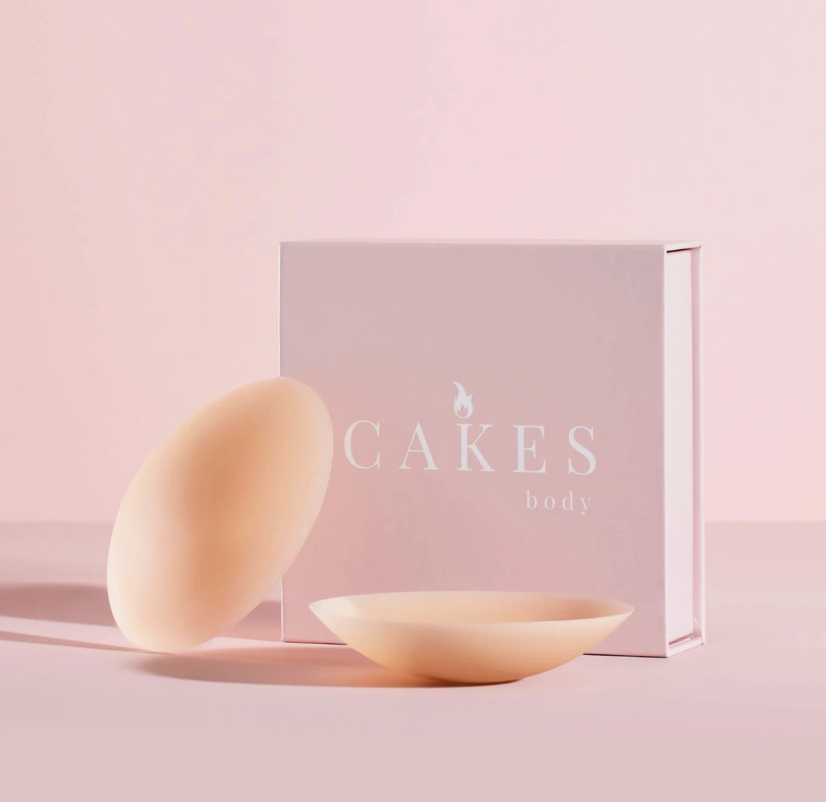 Close-up of smooth silicone material against skin tone background
