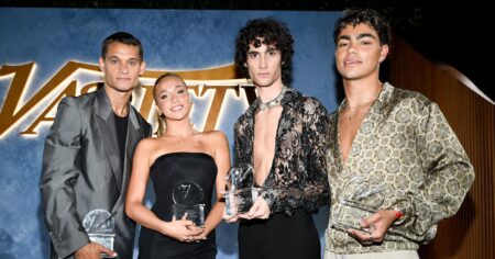 Guests gathered at an entertainment industry awards event in a hotel ballroom