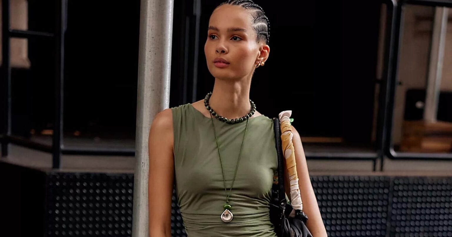 Woman wearing relaxed wide-leg drawstring trousers styled with a simple top