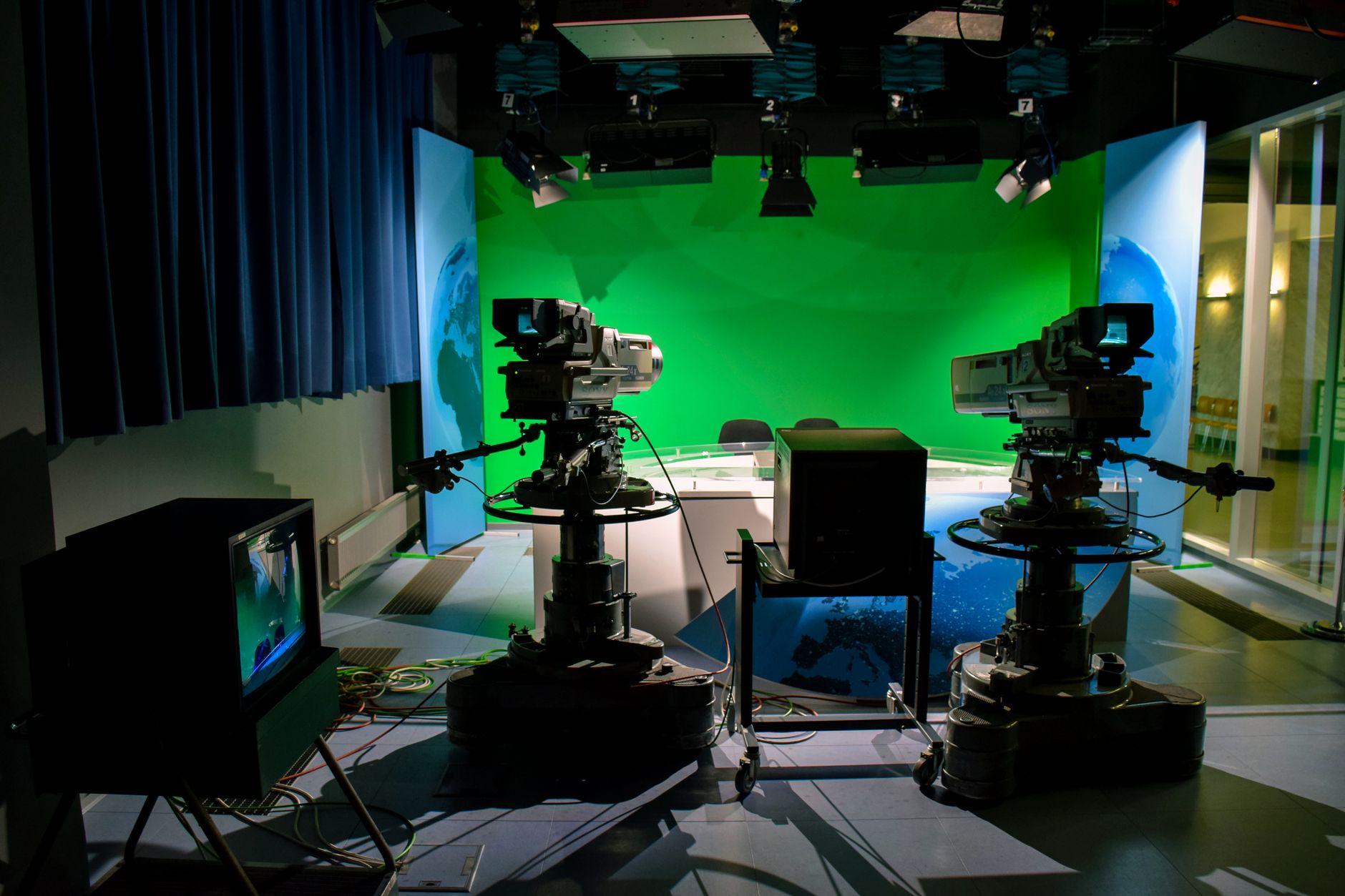 Bright studio lights set up for a television taping