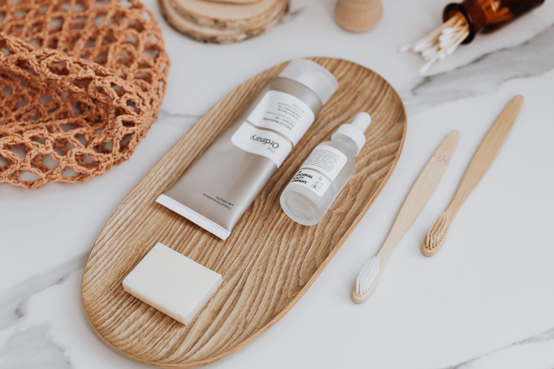 Assortment of plant-based beauty and haircare products on a table